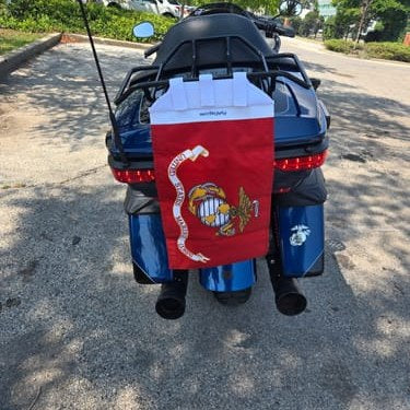 Marine Corps flag on the back of a customer's touring motorcycle