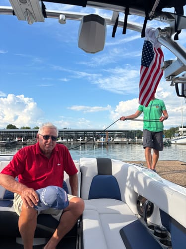 American flag on a boat tower by a dock, from Elisabeth B.'s review