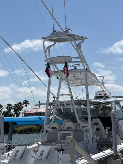 Texas flag on a boat tower beside an American flag — Shane K., verified buyer